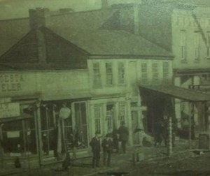 This frame building is believed to be  John Clugston's clock store.