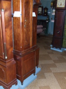 The long walnut case from the Clugston clock now stands with many other great clocks at the American Watch and Clock Museum in Bristol, CT.